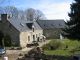 Close to Mur de Bretagne-Stone property in a quiet setting