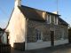 Near Guerl�dan, stone sottage with 2 bedrooms and a garden
