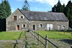 Near St-Nicolas-du-Pelem, lovelly stone property overlooking a lake