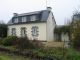 Close to Guerl�dan, farm house with stone outbuildings