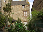 Secteur Plancoet: jolie maison en pierres dans village proche de la c�te