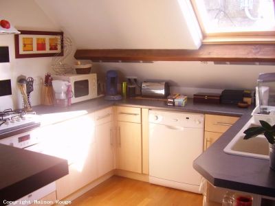 DANS UN BOURG AVEC COMMERCES APPARTEMENT DE CARACTERE