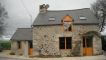 ENTRE DINAN ET LA C�TE. MAISON EN PIERRE RENOVEE AVCEC GO�T. 3 PIECES. TERRAIN DE 461 M�. REF 15471.