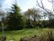PROCHE PORT DE PLAISANCE Terrain de 2000 m2 a vendre avec Grand Garage � Camoel