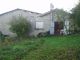 Charente: Petite maison avec local et sous sol.